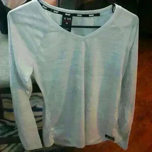 Women's sz med Tapout long sleeve moisture wicking shirt.